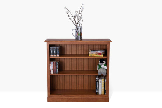 Acadia Cottage Bookcases: 12" deep nutmeg finish, charming rustic design, perfect for small spaces. Shelving is adjustable.