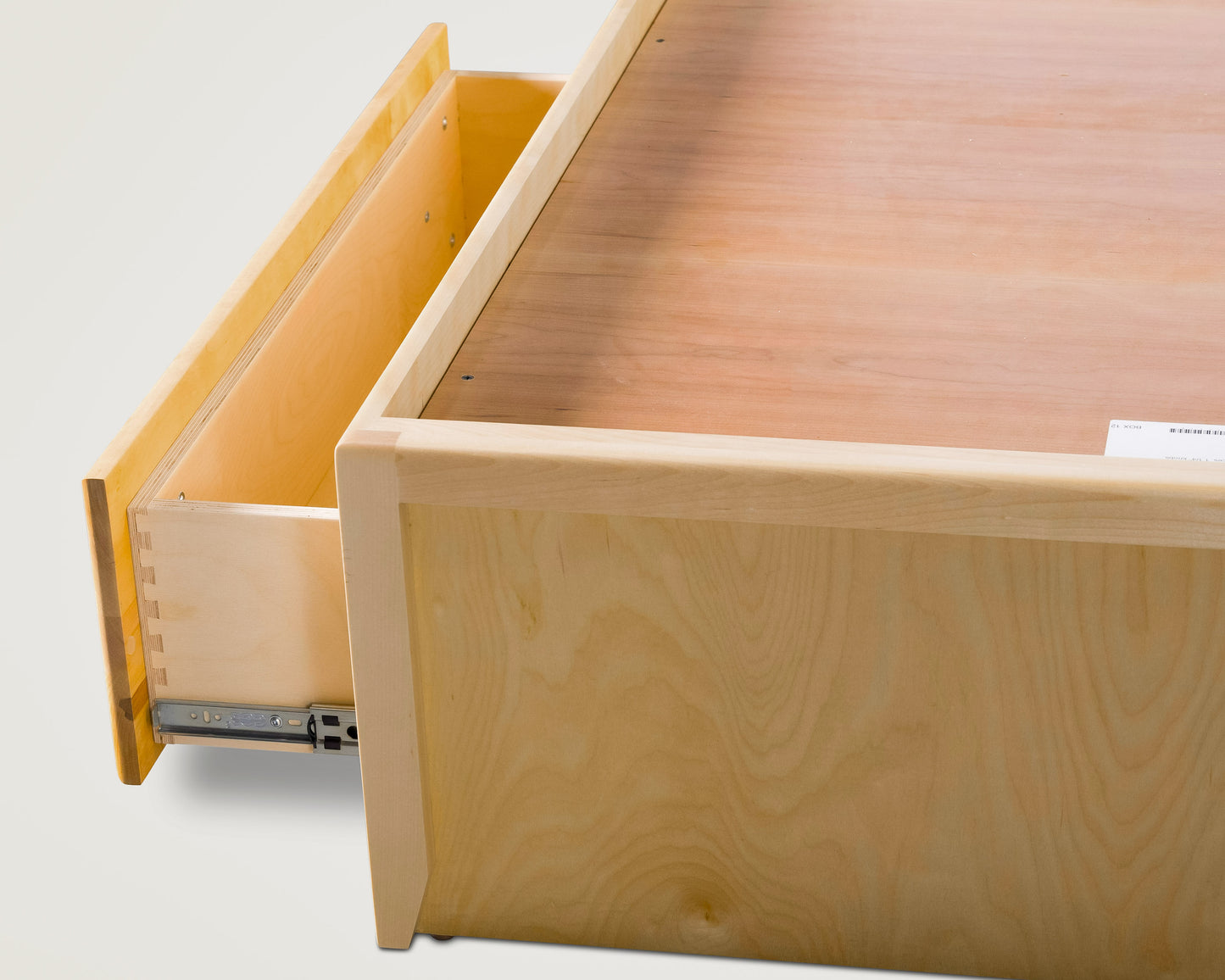 Acadia Shaker Storage Bed with two Drawers, close up details of the drawer and joinery. Pictured in Natural finish.