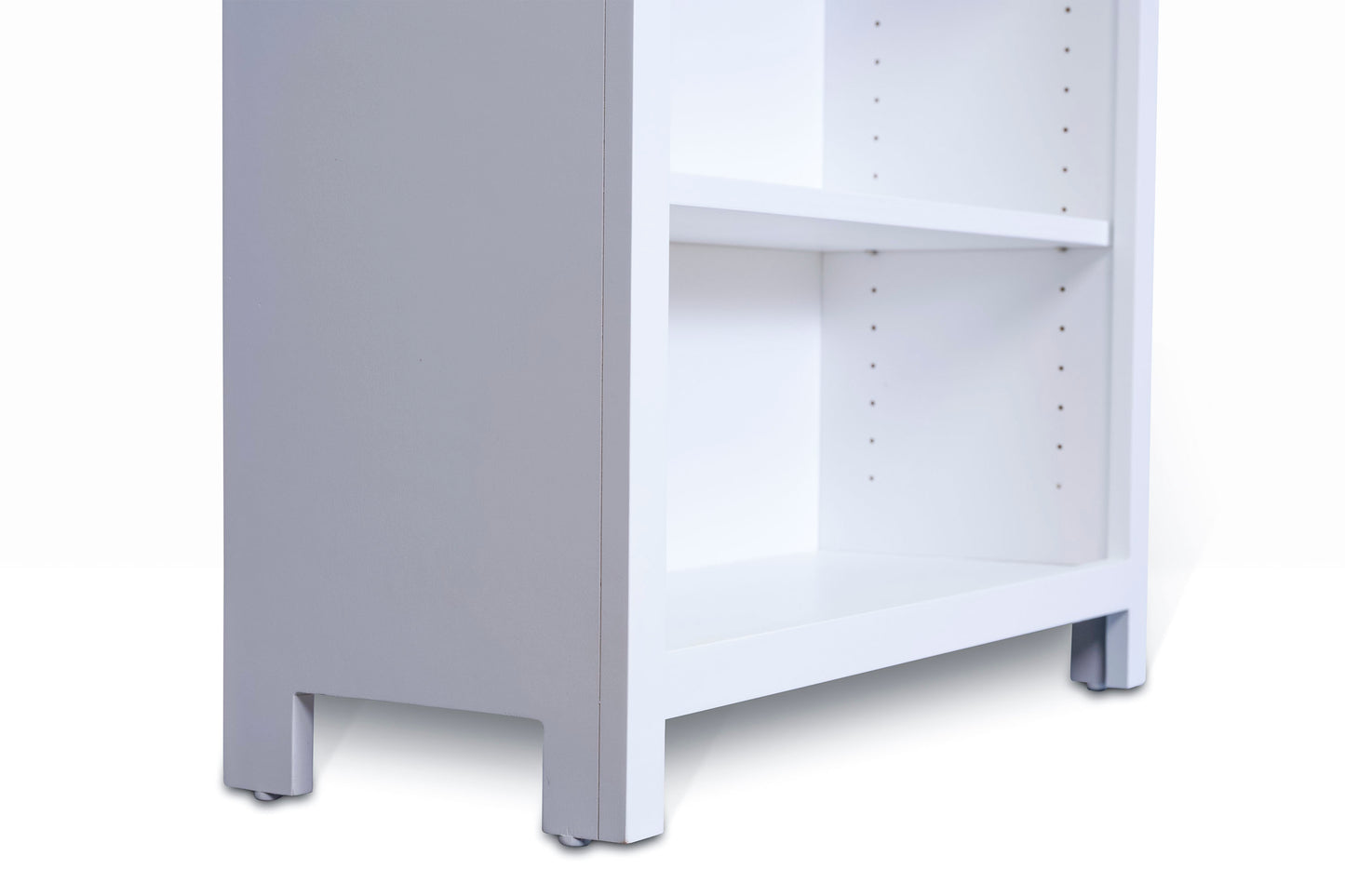 Acadia Tremont Bookcase is built in birch and features adjustable shelves. Shown close up to show details and the adjustable shelving.