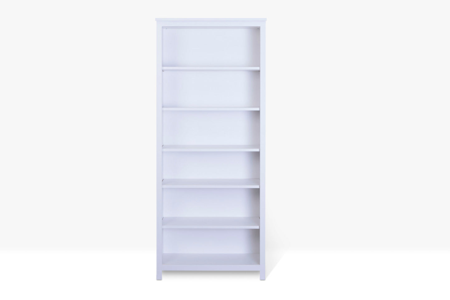 Acadia Tremont Bookcase Show empty in white finish. Made with birch.