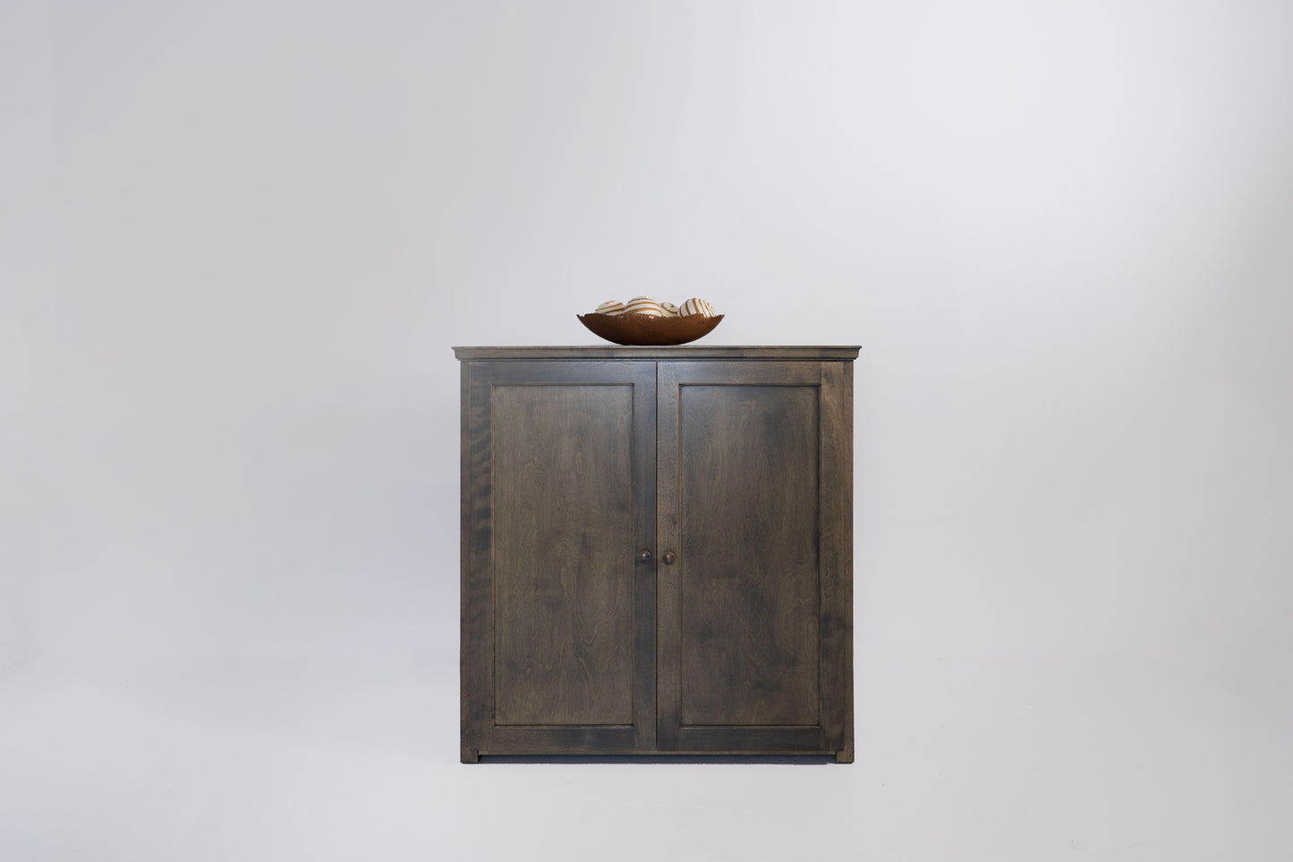 Berkshire Plymouth Cabinet is built in birch and features adjustable shelving. Shown in Foggy Oak finish.