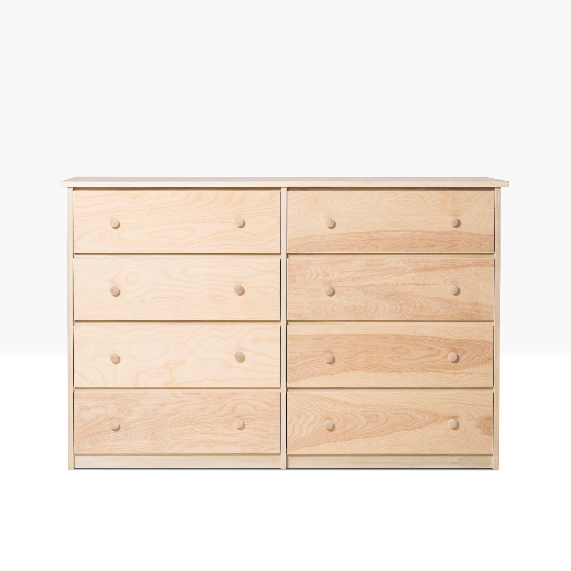 Evergreen Dresser features eight drawers constructed in pine and birch, shown unfinished.