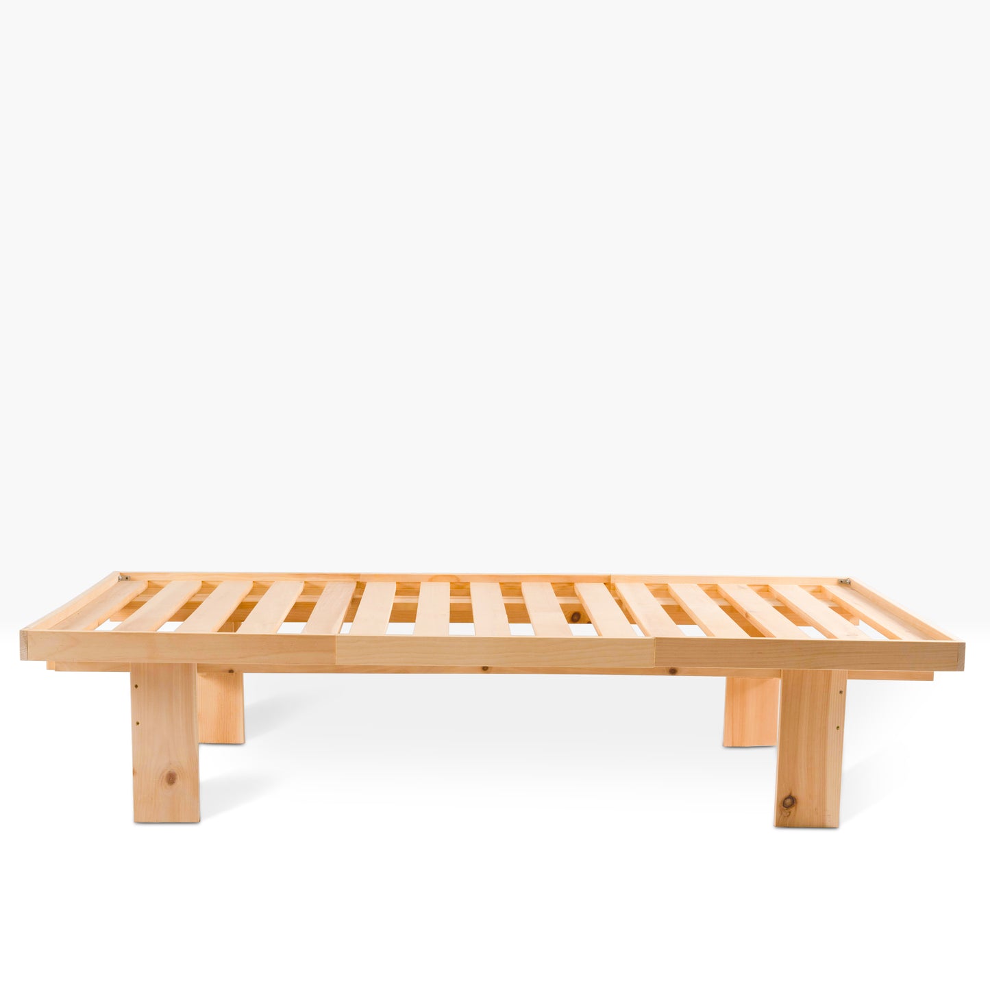 Evergreen Slat Bed shown from the side, constructed from unfinished white pine.