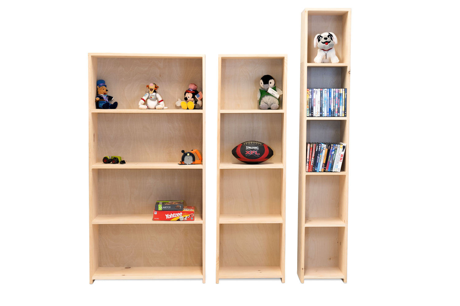 Three bookcases built in pine that are unfinished.