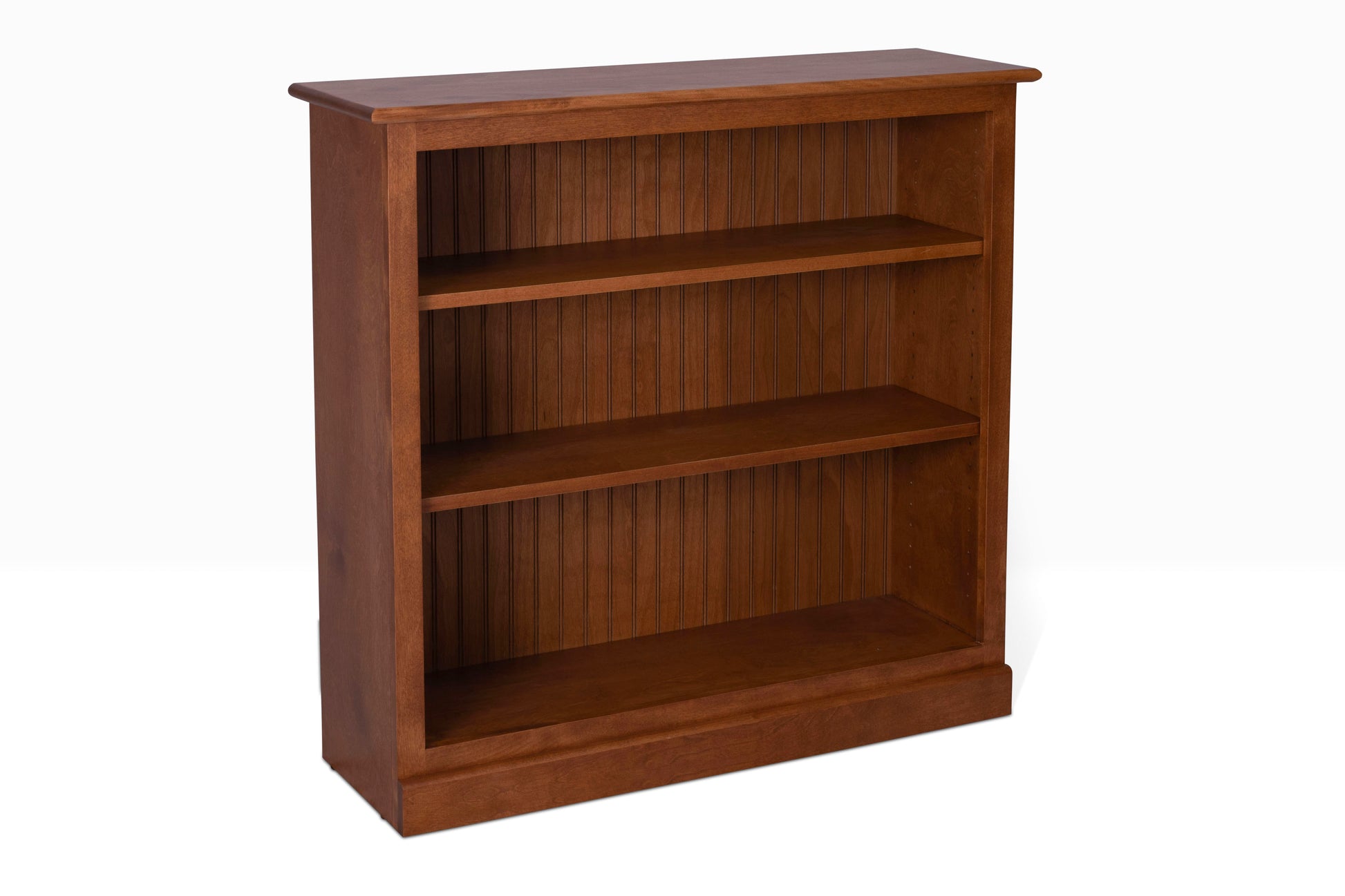 Acadia Cottage Bookcases: Rustic and charming design, nutmeg finish, fits perfectly in smaller spaces with 12" depth. Shelving is adjustable.