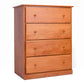 Acadia Cottage Chest: 4 drawers, rustic charm, nutmeg finish. Pictured from the front angle with bead board sides.