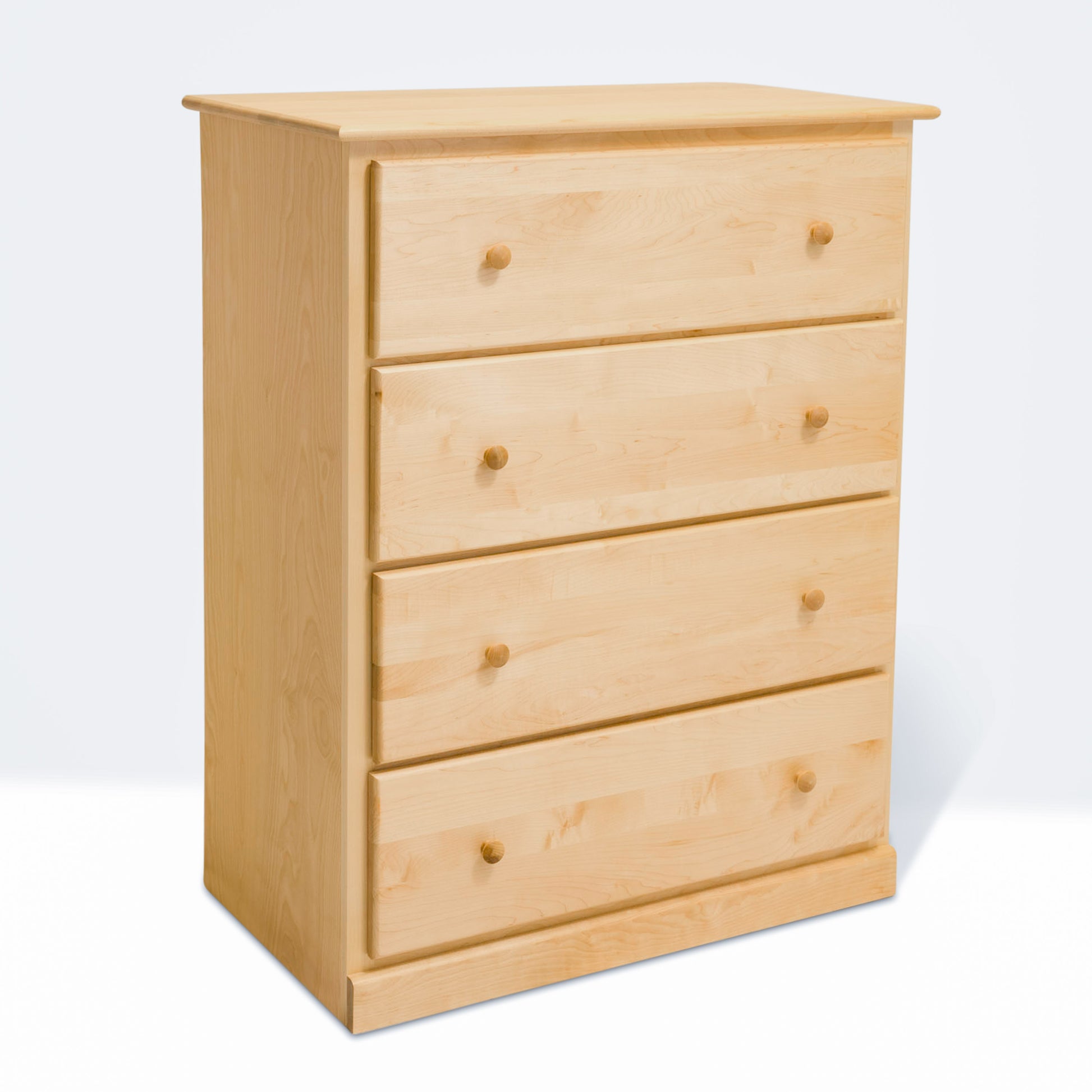 Acadia Cottage Chest: 4 drawers, rustic charm, natural finish. Pictured from a front side angle.