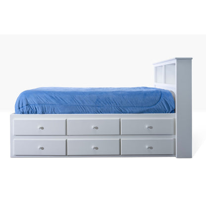 Acadia Cottage Storage Bed with 6 drawers on one side and a book case headboard for storage. Pictured in white. Shown from the side to highlight the storage space.