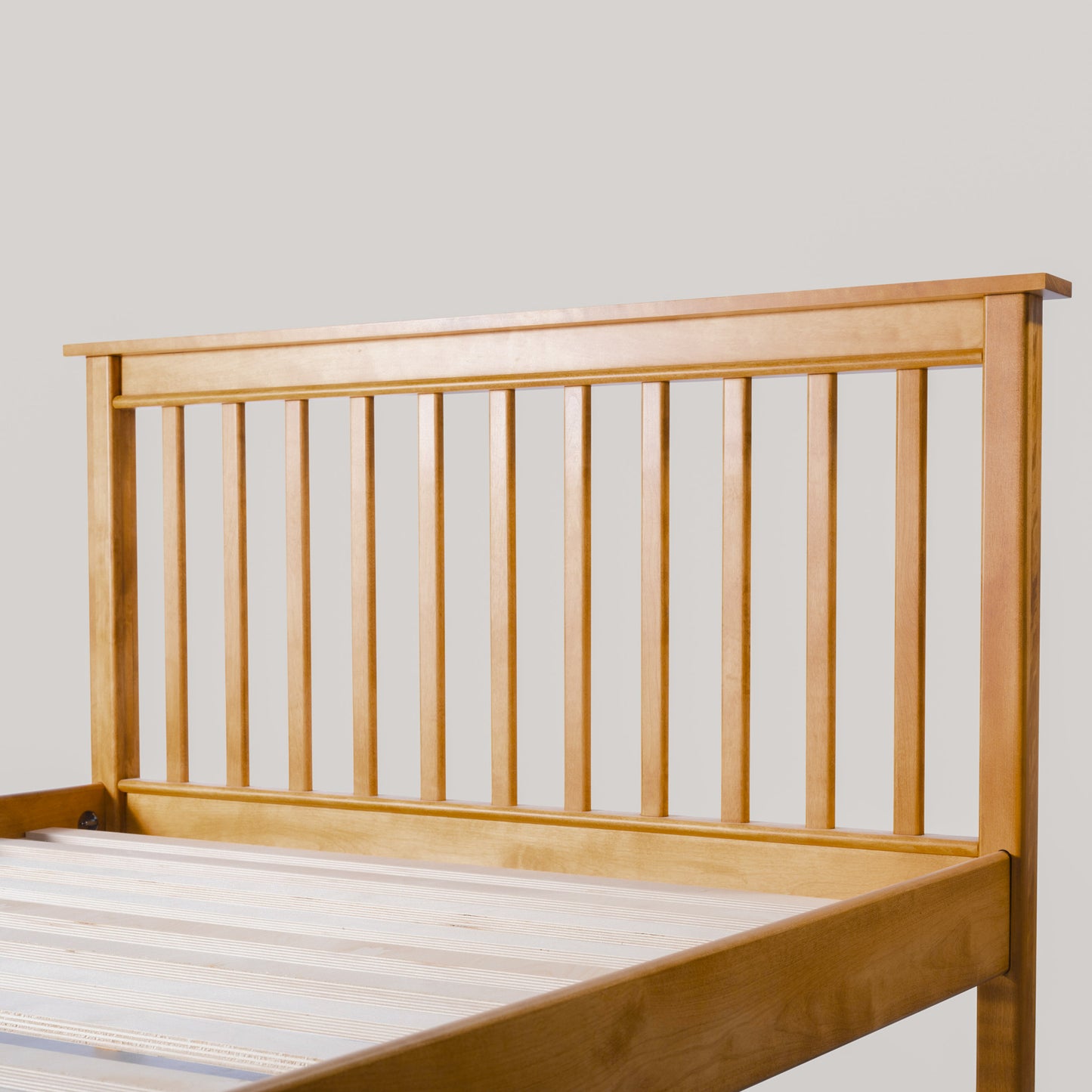 Acadia Shaker Platform Bed in Autumn Gold finish, shown close up to further show details in headboard.