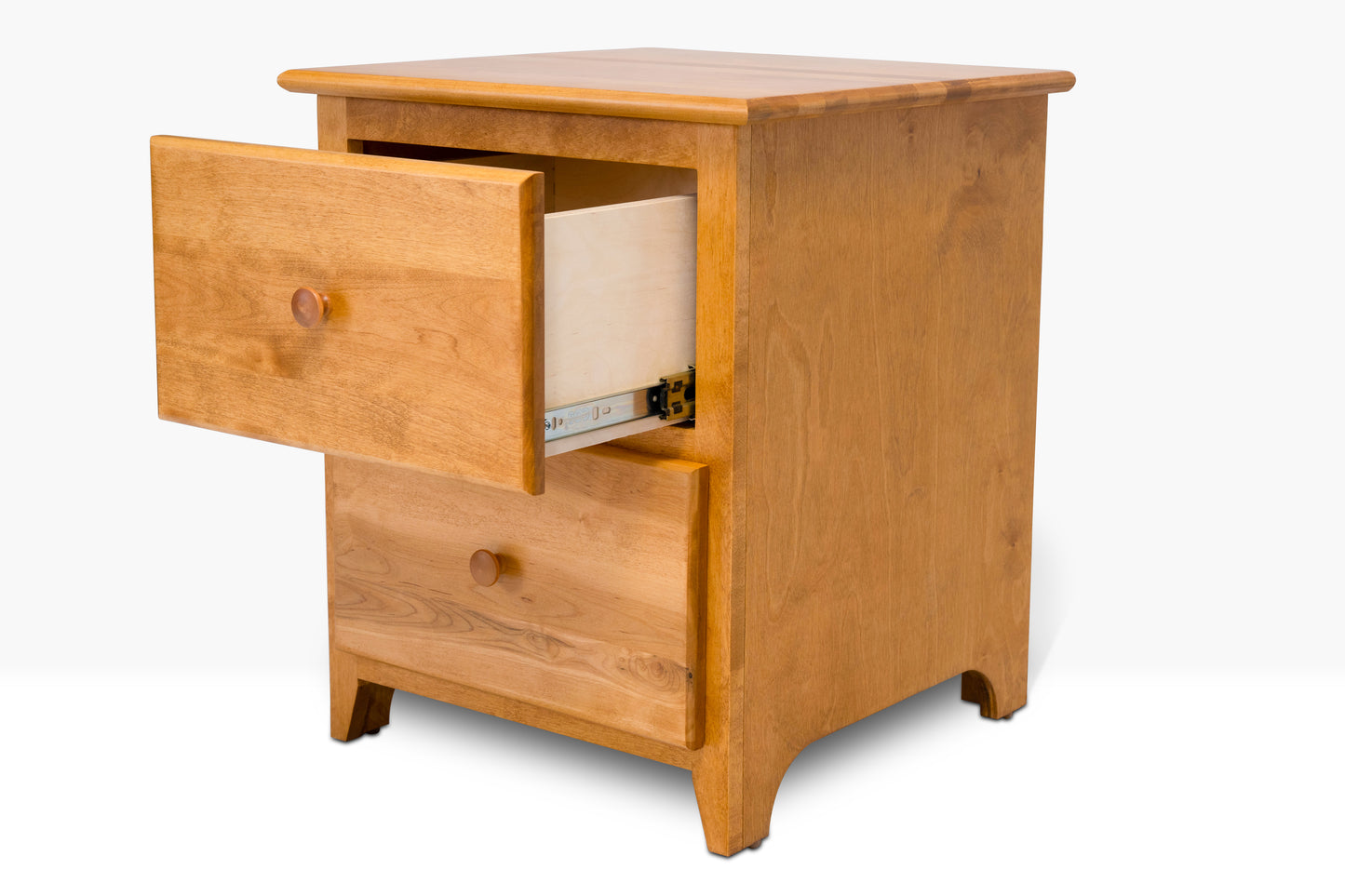 Acadia Shaker Two Drawer Nightstand is built from birch and features two drawers. Pictured in Autumn Gold finish with drawer open to show extension.