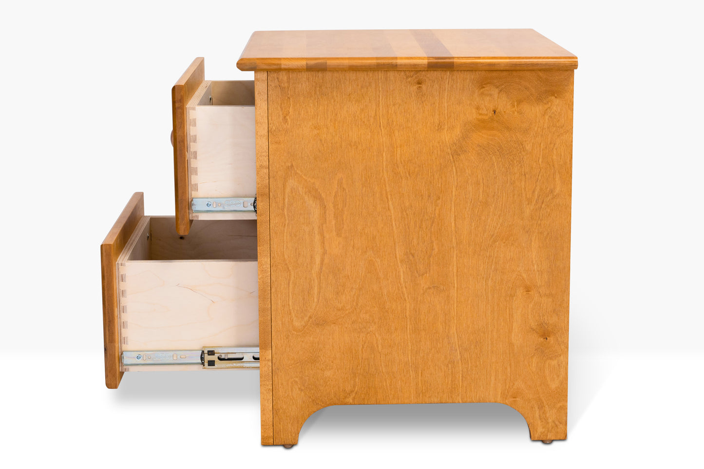 Acadia Shaker Two Drawer Nightstand is built from birch and features two drawers. Pictured in Autumn Gold finish shown with both drawers open to highlight storage space available.