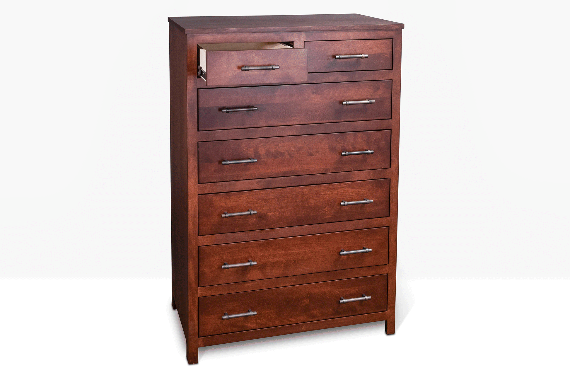 Acadia Tremont Chest with Split Top Drawer, shown in cherry finish with drawers open to highlight storage space.