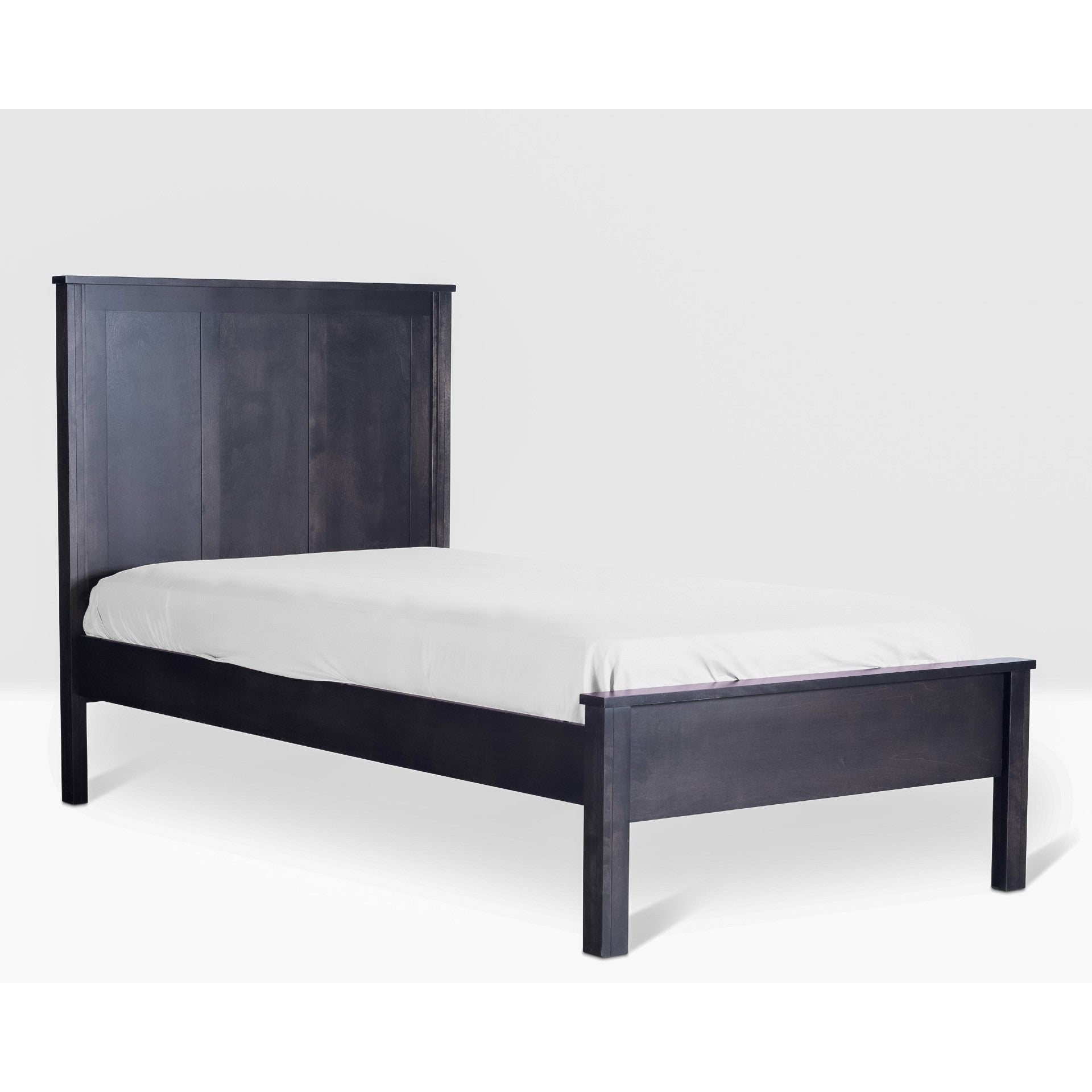 Acadia Tremont Platform bed with Simple Footboard is constructed in birch, and shown in a Nitefall finish.