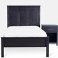Acadia Tremont Platform Bed with Simple footboard, shown from the front with a one drawer nightstand, in Nitefall finish.