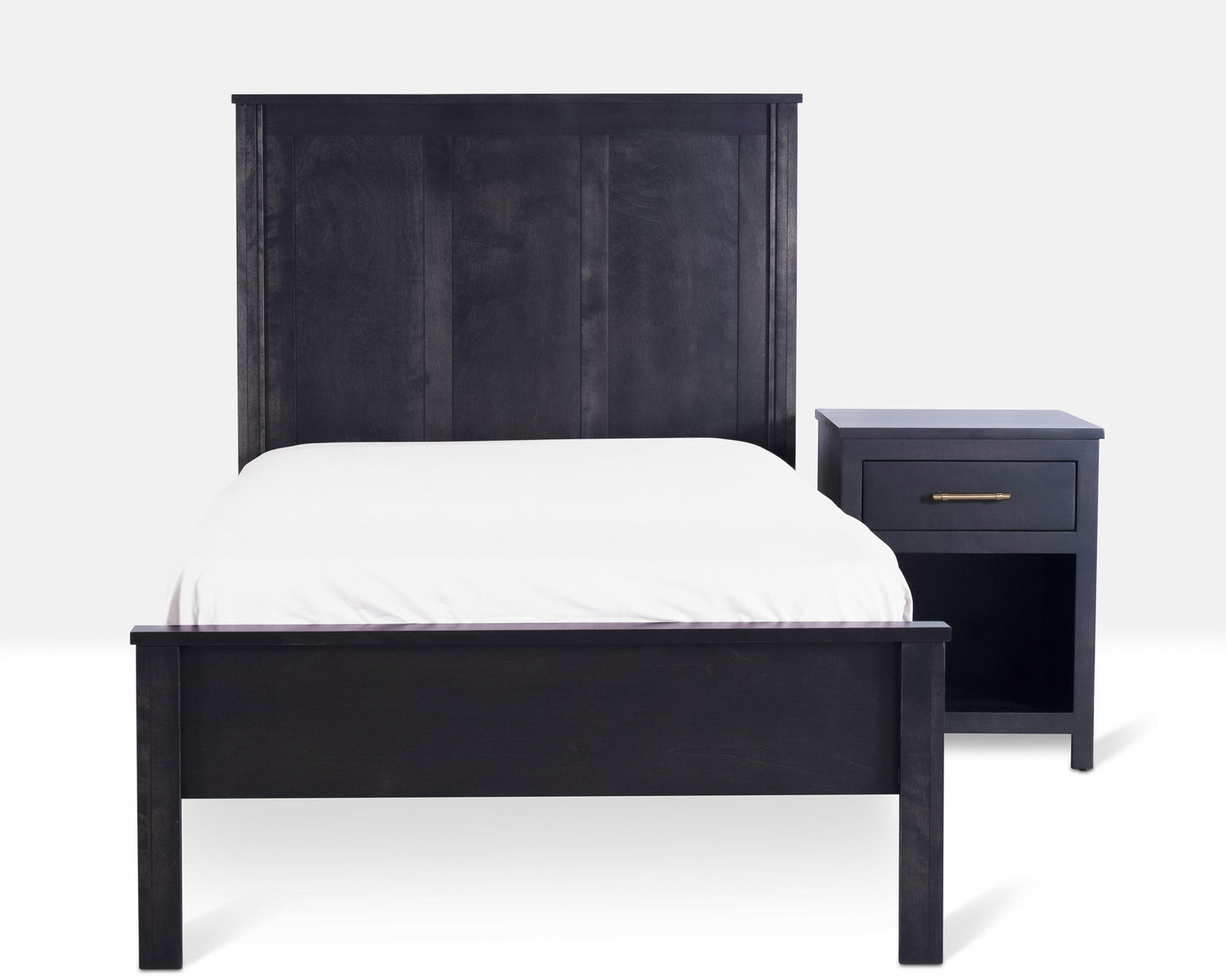 Acadia Tremont Platform Bed with Simple footboard, shown from the front with a one drawer nightstand, in Nitefall finish.