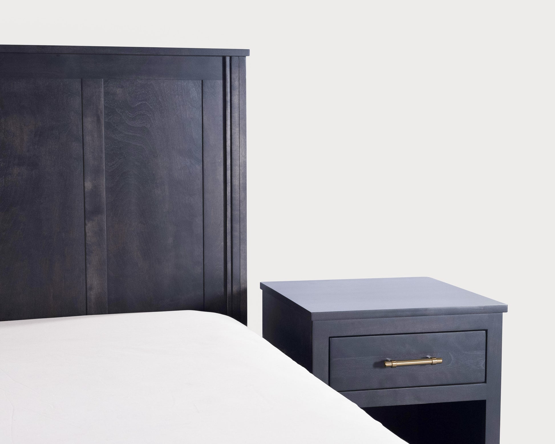 Acadia Tremont Platform Bed with Simple Footboard shown close up on headboard to highlight details.