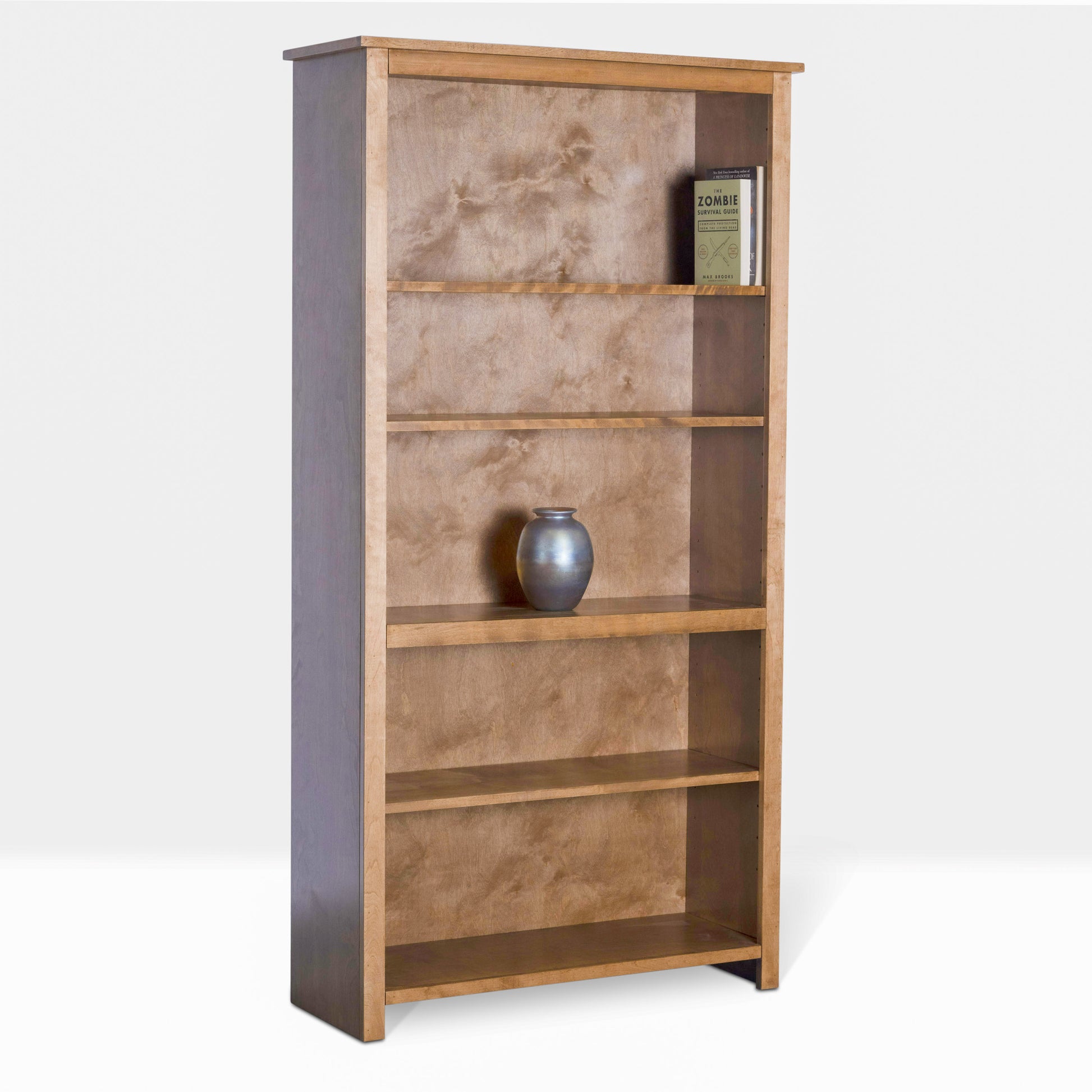 Berkshire Easton Bookcase, built in birch wood, and shown from an angle. Pictured in Distressed Pecan finish.