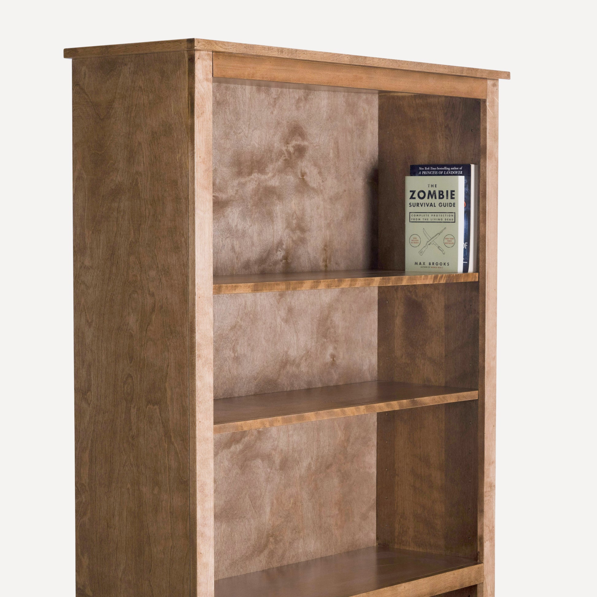 Berkshire Easton Bookcase, built in birch and shown close up to highlight edge details. Pictured in Distressed Pecan finish.