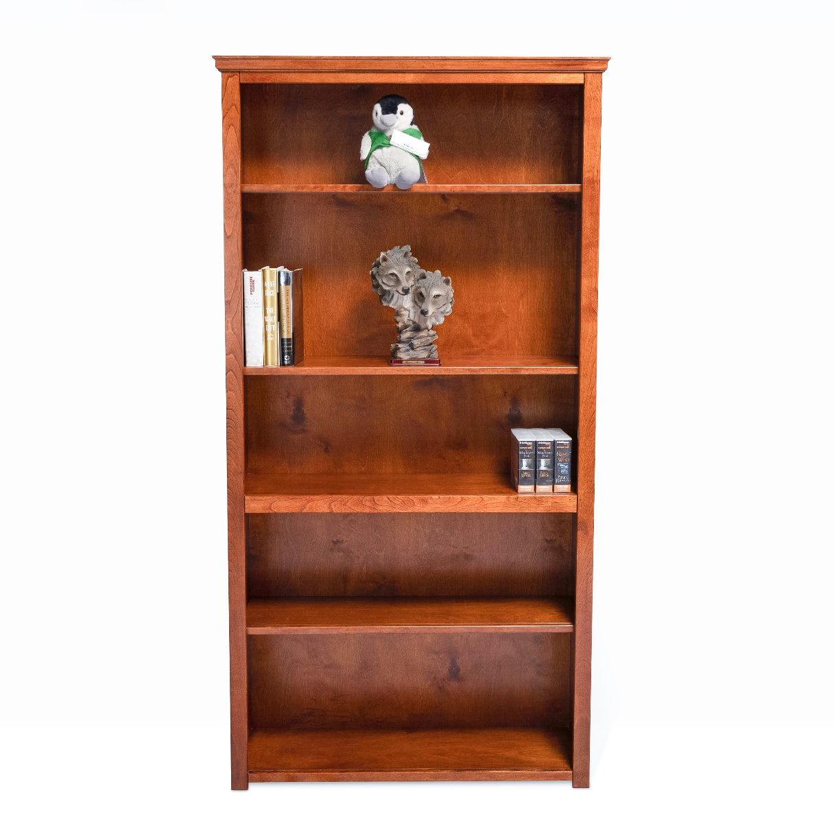 Berkshire Plymouth Bookcase is built in birch and features adjustable shelving. Shown in Orange Walnut finish.