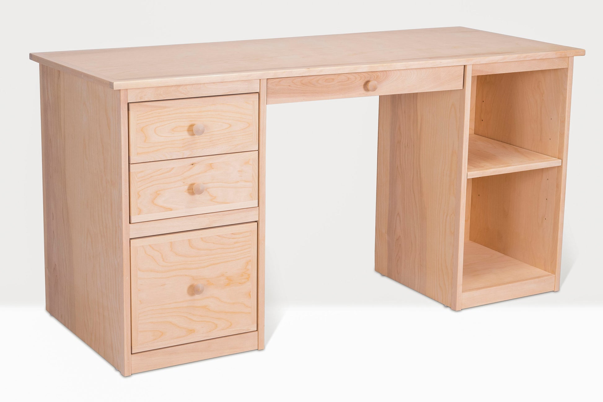 Berkshire Home Desk is made with birch hardwood and features four drawers and adjustable shelving. Shown unfinished.