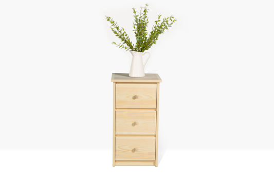 Evergreen Three Drawer Nightstands feature three drawers and pine construction. Shown unfinished.